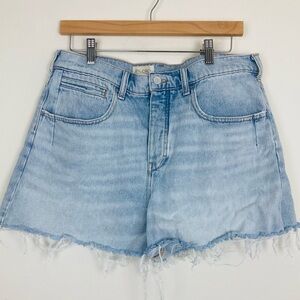 Anthropologie Pilcro light wash denim cutoff shorts. Size 31